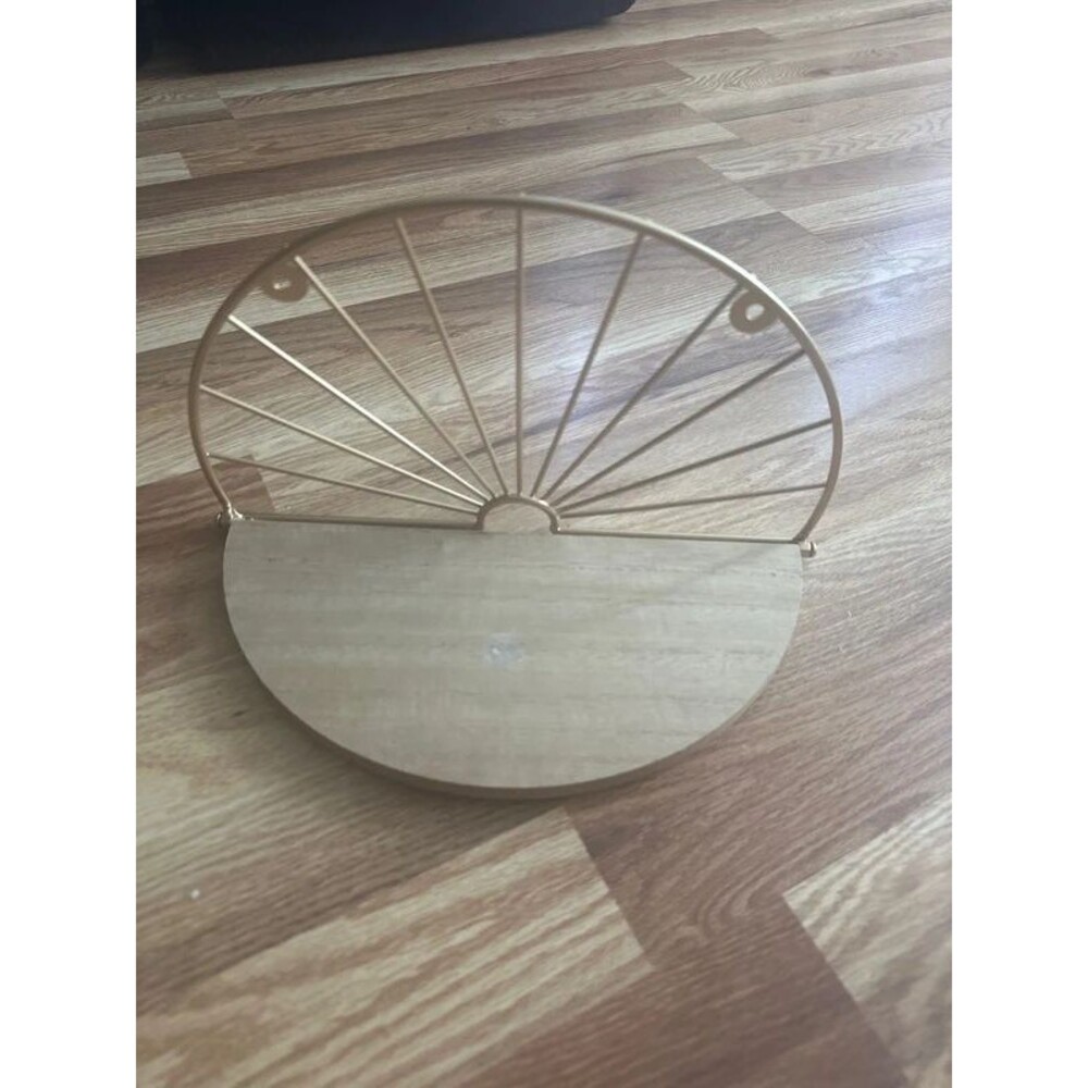 Gold and wood shelf
